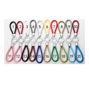 Sélection de vingt porte-clés colorés en cuir PU tressé pour clés de voiture et cadeaux
