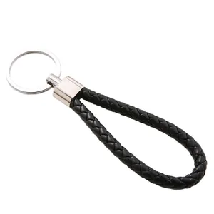 Porte-clés créatif en cuir PU noir tressé avec anneau en métal argenté pour clés