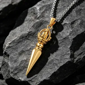Intricate gold-colored titanium steel Vajra pestle pendant necklace on silver box chain