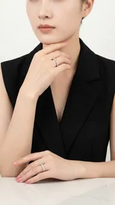 Elegant S925 sterling silver moissanite eternity ring worn on a female model's finger