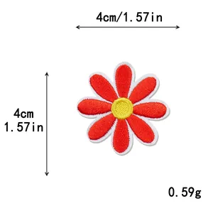 Detailed red flower embroidered patch with yellow center, 4cm x 4cm dimensions
