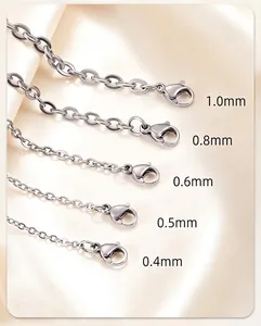 Detail view of stainless steel O-chains in sizes from 0.4mm to 1.0mm with lobster clasps