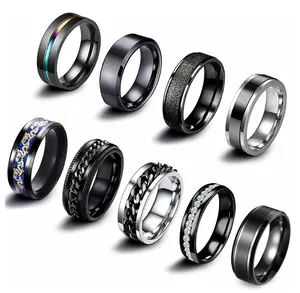 Collection of nine unique stainless steel rings featuring chain and dragon designs