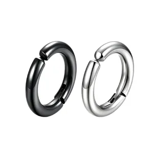 Minimalist men's titanium steel ear clips in polished black and silver stainless finishes