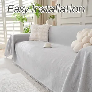 Housse de canapé en chenille gris uni de qualité avec détails de franges décoratives