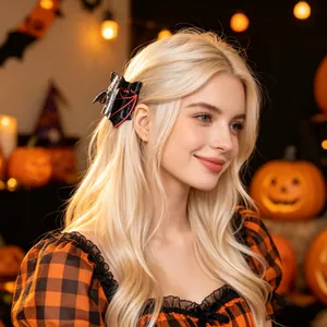 Detail showing a blonde model wearing a black bat hair claw clip in a Halloween setting