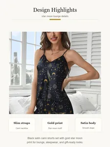 Close-up detail of black satin cami and shorts set with gold star and moon print motif