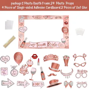 Rose gold bachelorette party photo booth props set with large frame and fun accessories