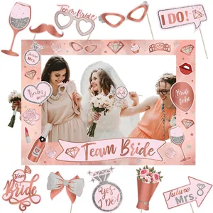 Rose gold bachelorette party photo booth props with frame and handheld signs