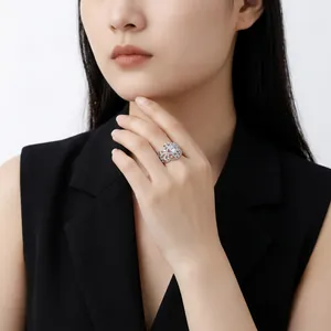 Luxury 925 silver filigree ring fully encrusted with moissanite stones on an Asian model