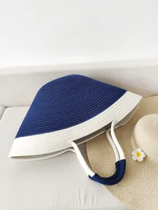 Large woven cotton rope tote bag in blue and white contrast color for beach vacation