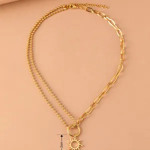 Gold-plated stainless steel necklace with 2cm hollow sun pendant, asymmetric design