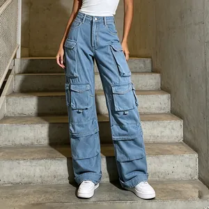 Detailed view of light wash multi-pocket cargo denim pants with a wide-leg fit.
