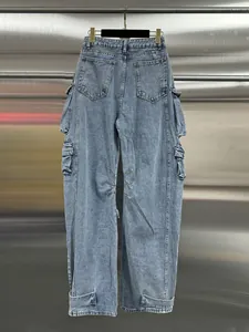 High-waist wide-leg cargo jeans in light blue wash with multiple utility pockets.