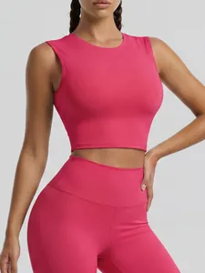 Vibrant pink two-piece sports yoga set featuring a crop top and high-waisted leggings