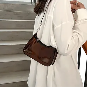 Stylish brown transparent jelly underarm bag for women, 2025 fashion trend design