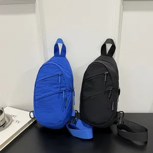 Pair of minimalist nylon sling bags in blue and black colors for casual commuting