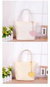 Minimalist dopamine tote bags with heart charms in cream and yellow casual handbag.