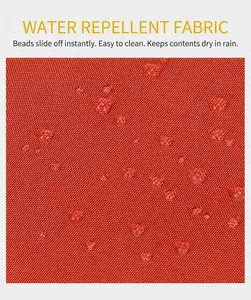 Makroansicht von wasserabweisendem orangefarbenem Nylongewebe mit klaren Tropfen