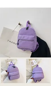 Compact purple nylon mini backpack for women with stylish and lightweight design detail