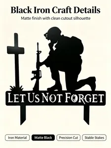 Close-up of matte black fallen soldier memorial garden stake with cutout silhouette