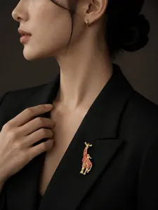 Detailed view of a colorful enamel giraffe brooch pinned on a black blazer