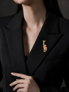Elegant close-up of a colorful giraffe enamel brooch pinned on a black blazer lapel