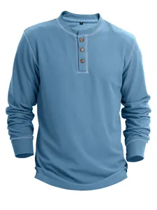 Detailed view of the blue waffle knit texture and Henley collar on a men's shirt