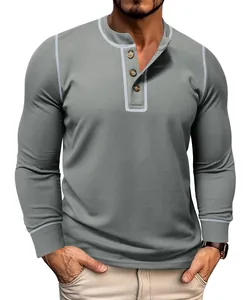 Detailed view of the gray waffle knit texture and button placket of the men's long sleeve tee