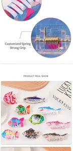 Assortment of cute ocean animal hair claws including shark and tropical fish designs