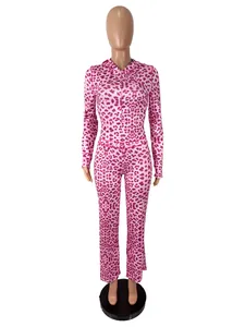 Two-piece pink leopard print tracksuit with zip-up hooded jacket and slim-fit pants