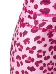 Macro view of pink leopard print leggings with high-quality flatlock stitching