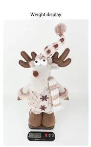 Vue détaillée montrant le poids de 350g de cette peluche de renne de Noël festive