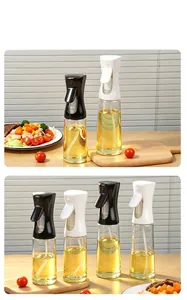 Fine mist kitchen oil spray bottles in black and white glass for healthy cooking and BBQ