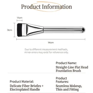 Macro view of flat-top foundation brush with chrome handle and synthetic fiber bristles