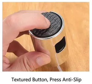 Close-up view of the textured anti-slip button on the stainless steel oil sprayer.