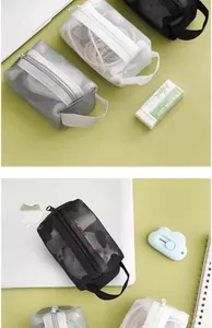 Top view of portable multi-colored nylon mesh storage bags for cables and stationery items