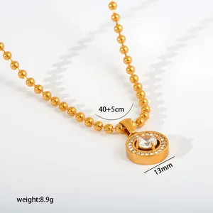 Close-up of gold stainless steel pendant necklace with 13mm size and 8.9g weight