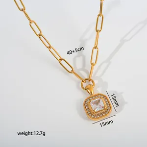 Close-up detail of gold stainless steel square pendant necklace with dimensions and weight