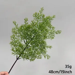 Detailed close-up of 48cm artificial green cedar branch for home and garden decor