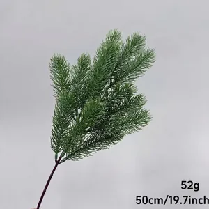 Detailed view of artificial green pine branch for Christmas decoration and landscaping