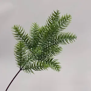 Realistic artificial cedar branch for Christmas decoration and greenery landscaping