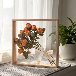 Vintage style artificial rose bouquet displayed in a wooden square frame for elegant home decor