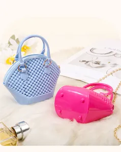 Detailed view of mini pearl shell jelly bags featuring beaded texture and gold chain strap