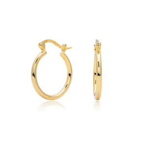 Detailed view of polished S925 sterling silver gold-plated hollow hoop earrings.