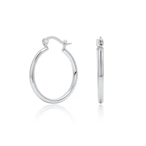 Detail view of polished S925 sterling silver hoop earrings with hollow tube design