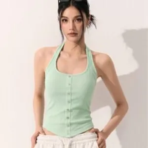 Front view of a light green ribbed halter top with buttons and asymmetric hem detail