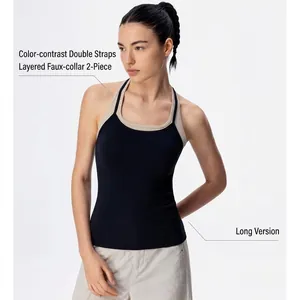 Detail of the layered double shoulder straps and slimming long fit yoga tank top