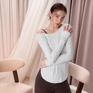 White off-shoulder long sleeve top with thumb holes for yoga and fitness training