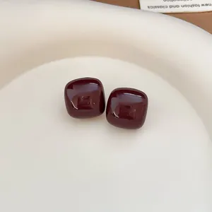 Minimalist glossy square enamel stud earrings in deep burgundy with silver needles